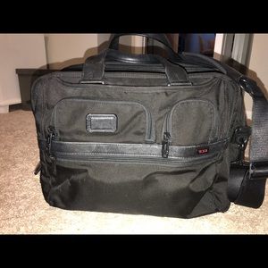 SOLD —- Black Tumi TPass Expandable Briefcase